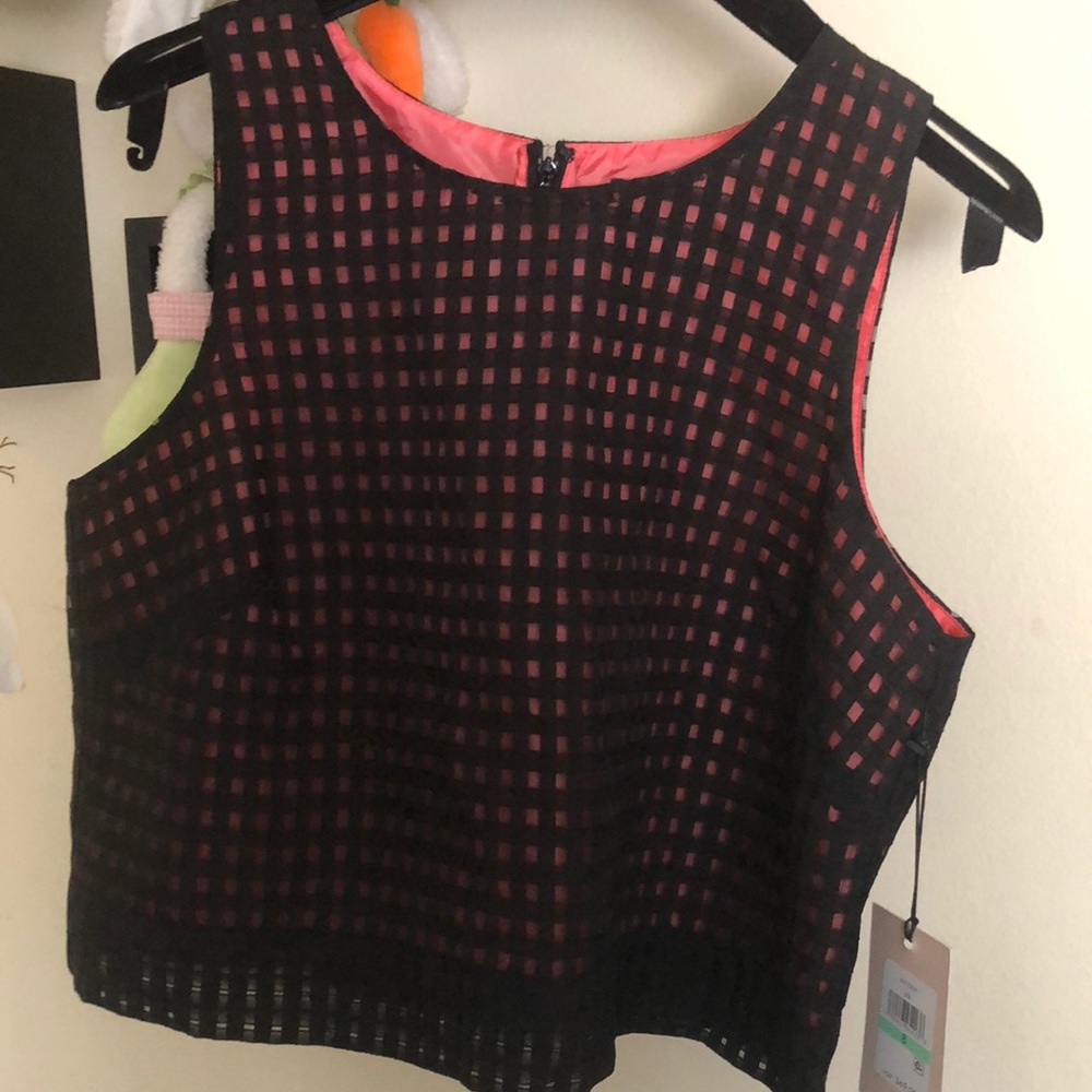 IT top, lining is salmon. dry clean only